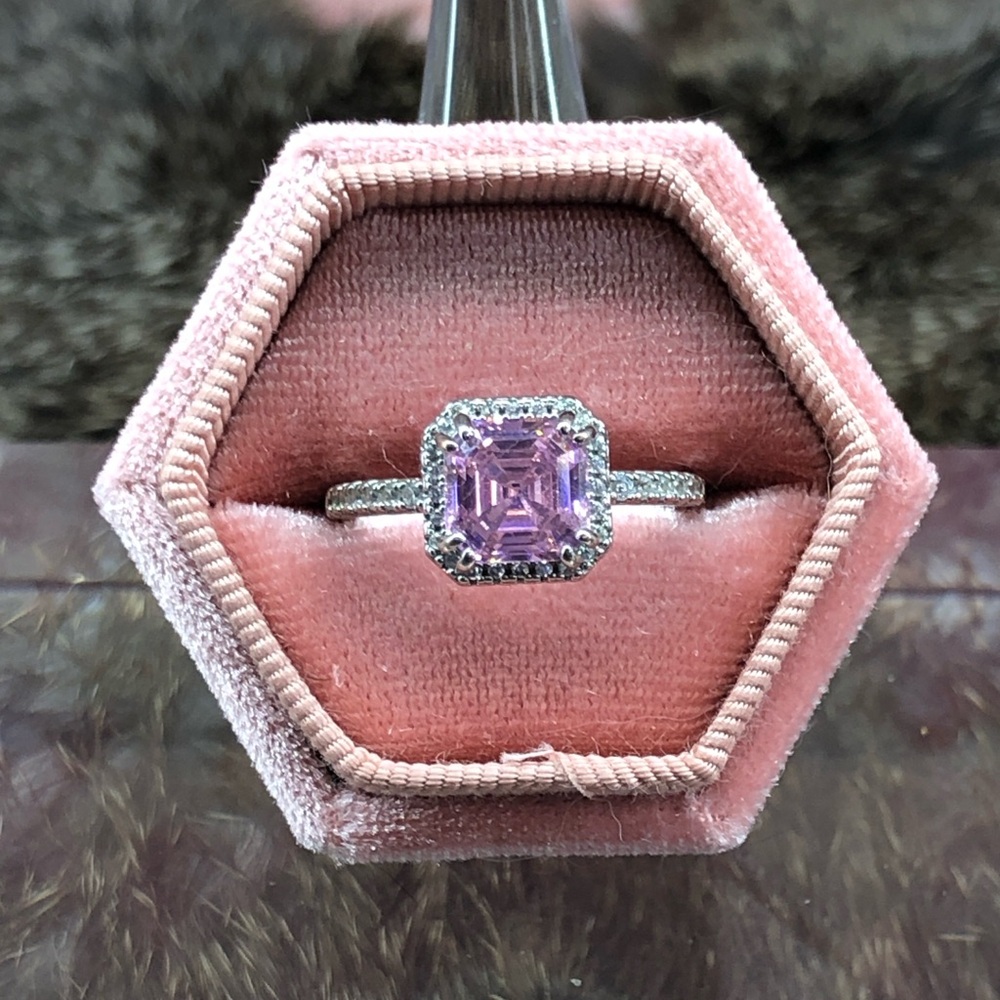 Elegant Silver Ring with Purple Gemstone